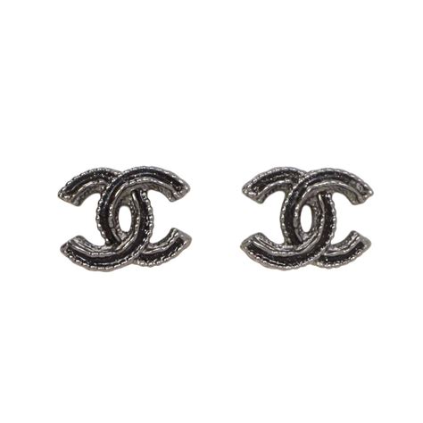 black chanel logo earrings.